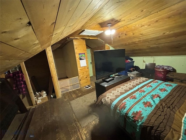 bedroom featuring wood-type flooring, wooden ceiling, and vaulted ceiling with skylight