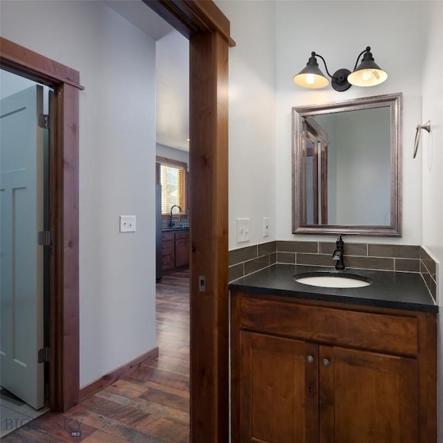 bathroom featuring vanity and hardwood / wood-style flooring