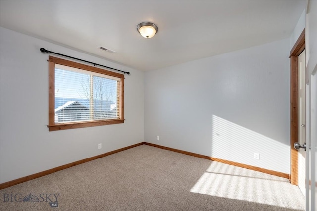 view of carpeted spare room