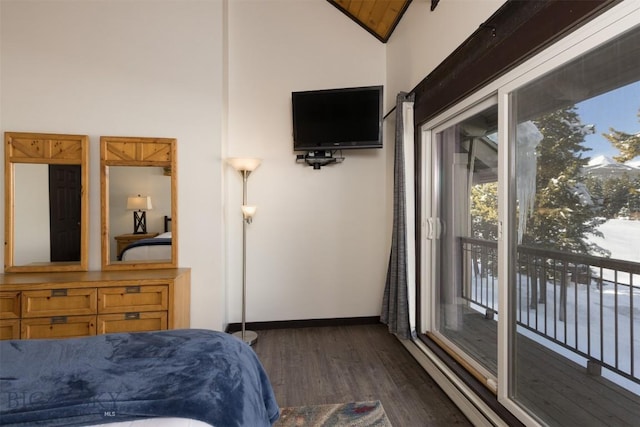 bedroom featuring dark hardwood / wood-style flooring, high vaulted ceiling, and access to outside