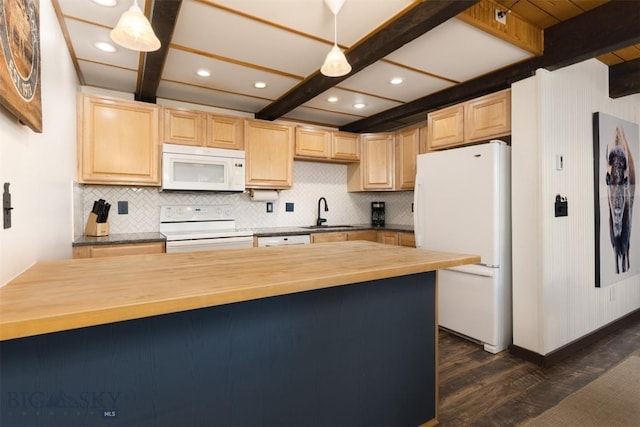 kitchen featuring pendant lighting, sink, white appliances, wooden counters, and dark hardwood / wood-style floors