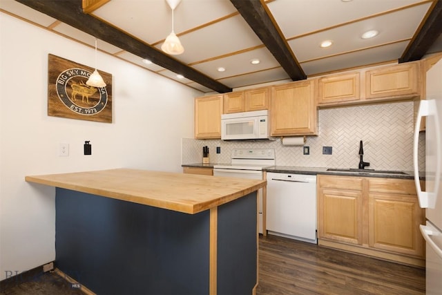 kitchen with pendant lighting, sink, white appliances, butcher block counters, and beam ceiling