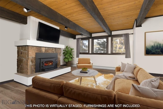 living room featuring wood ceiling, hardwood / wood-style flooring, a baseboard heating unit, a fireplace, and beamed ceiling