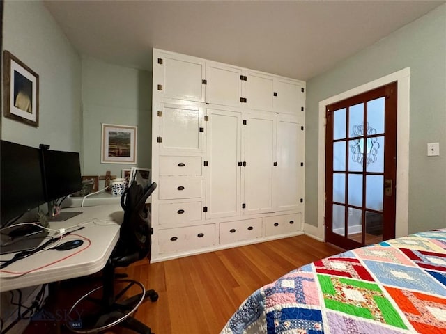 bedroom with light wood-type flooring