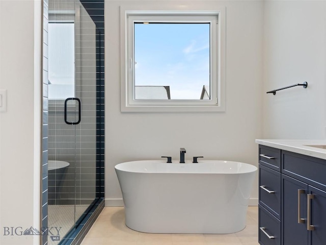 bathroom with vanity, tile patterned floors, and independent shower and bath