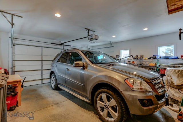 garage featuring a garage door opener