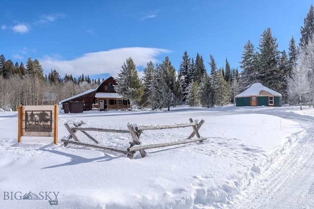 view of snowy yard