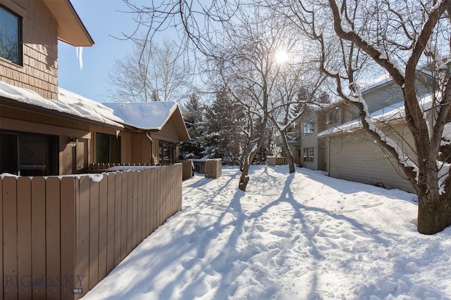 view of yard covered in snow