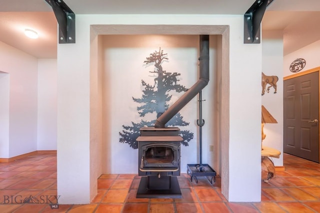 interior space featuring a wood stove