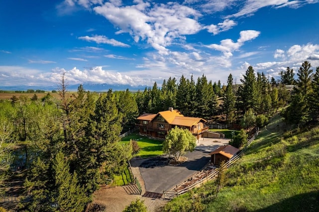 birds eye view of property with a rural view