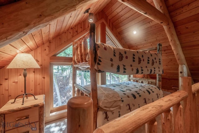 bedroom with vaulted ceiling with beams, wood ceiling, and wood walls