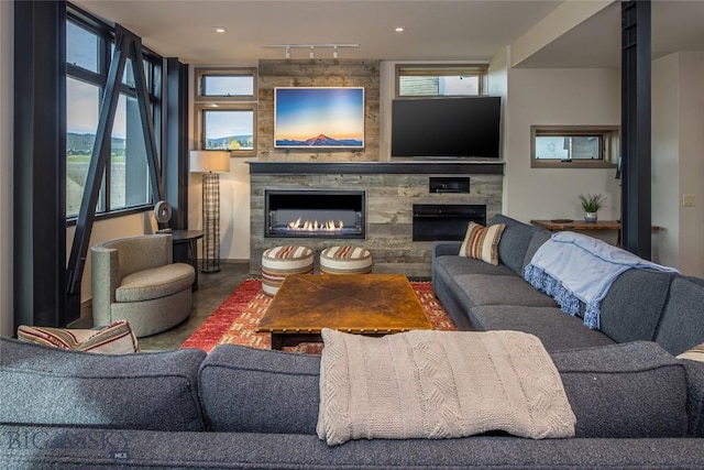 2174 Little Coyote Rd, Big Sky, MT 59716 - living area with a large fireplace and track lighting