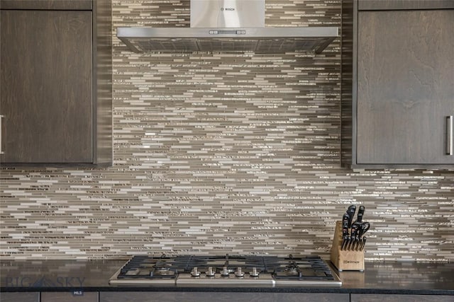 2174 Little Coyote Rd, Big Sky, MT 59716 - kitchen featuring exhaust hood, tasteful backsplash, and stainless steel gas cooktop