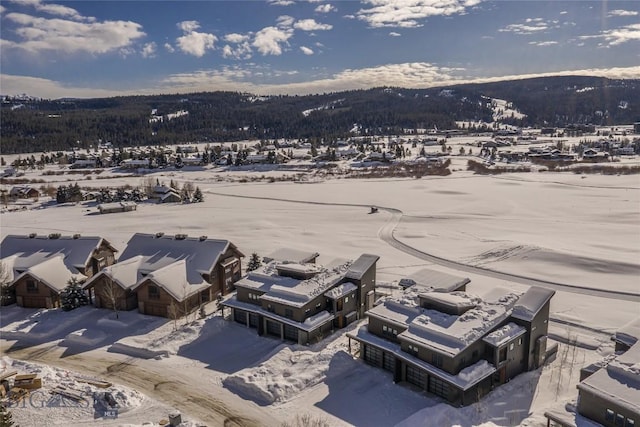 2174 Little Coyote Rd, Big Sky, MT 59716 - snowy aerial view with a mountain view