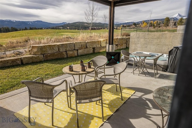 2174 Little Coyote Rd, Big Sky, MT 59716 - view of patio with a mountain view
