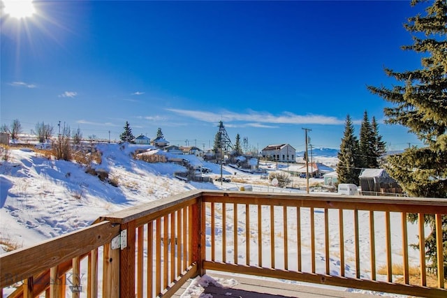 view of snow covered deck