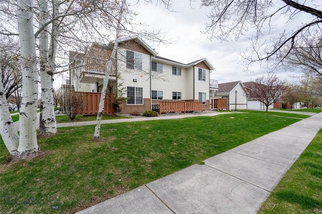 exterior space with a front lawn