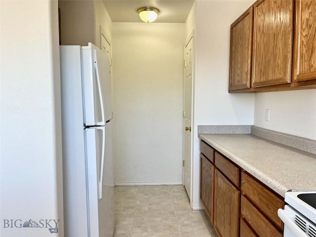 kitchen featuring white refrigerator