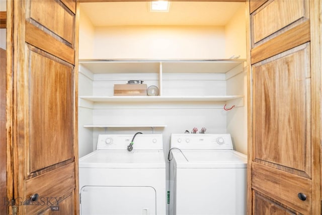 laundry area featuring independent washer and dryer