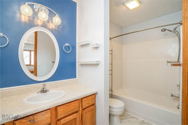 full bathroom featuring bathtub / shower combination, vanity, and toilet