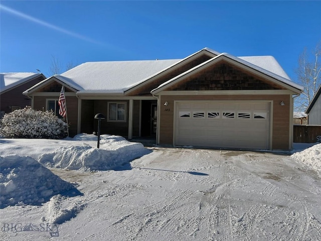 single story home featuring a garage