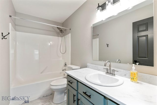 full bathroom with vanity, bathtub / shower combination, and toilet