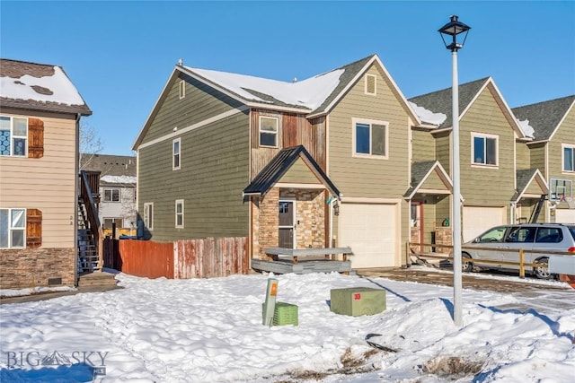 view of front of property featuring a garage