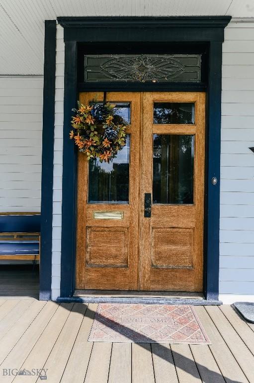 property entrance featuring french doors