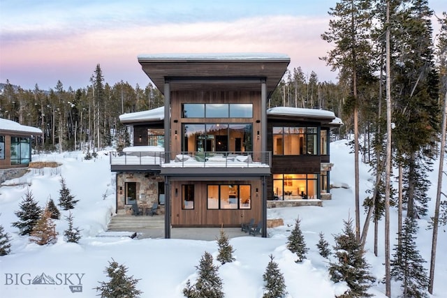 view of snow covered property