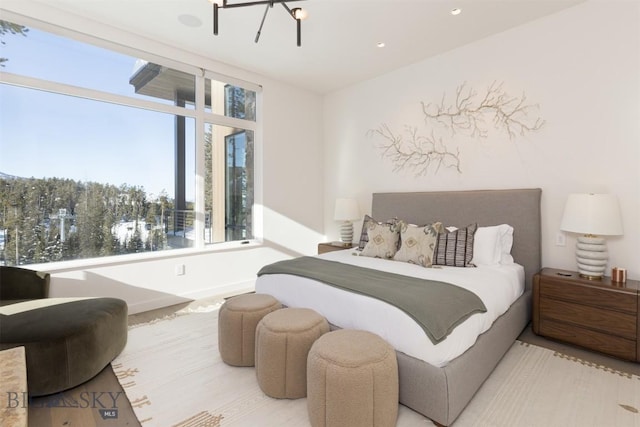 bedroom with a chandelier