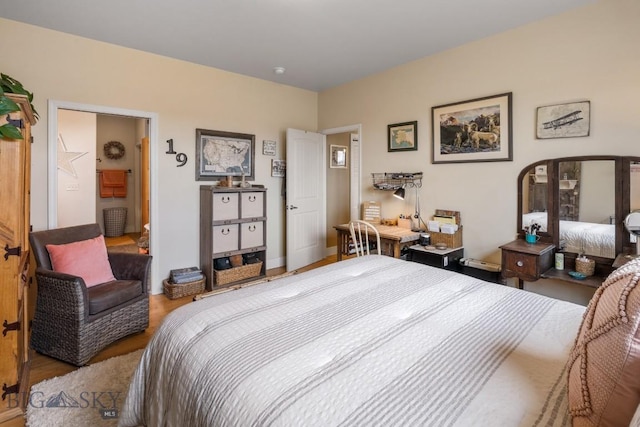 bedroom featuring wood-type flooring