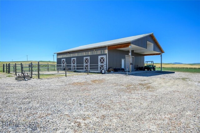 exterior space with a rural view