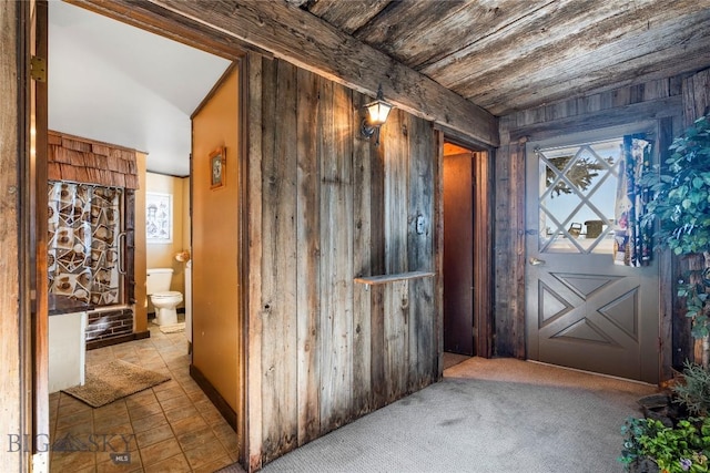 interior space featuring wood walls