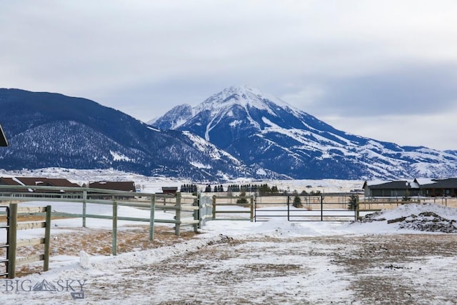 view of mountain feature with a rural view