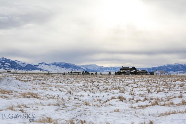 mountain view featuring a rural view