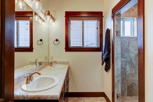 bathroom with vanity and an enclosed shower