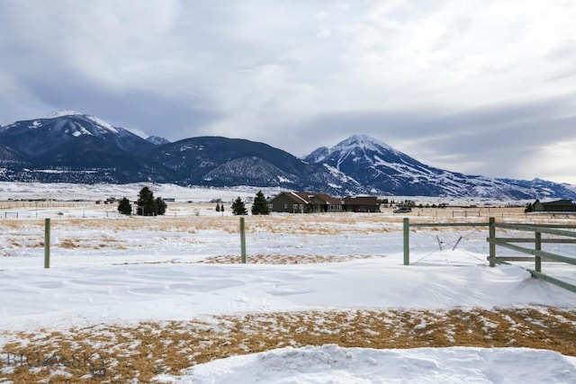 view of mountain feature with a rural view