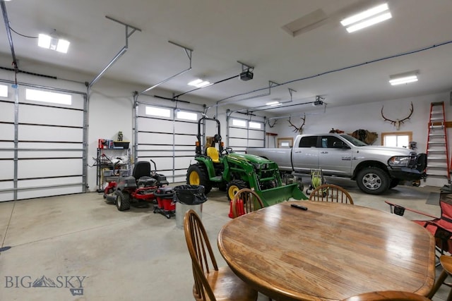 garage featuring a garage door opener