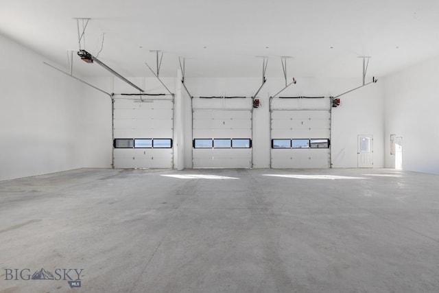 6111 Springhill Rd, Belgrade, MT 59714 - garage featuring a garage door opener