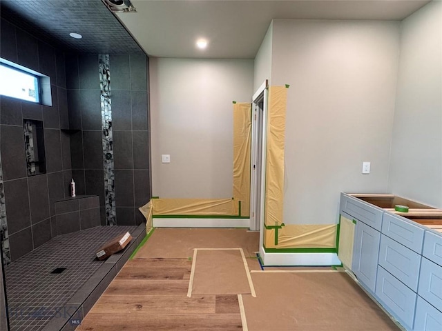 6111 Springhill Rd, Belgrade, MT 59714 - full bath featuring tiled shower, recessed lighting, and vanity