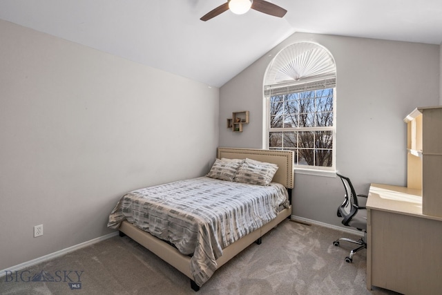 carpeted bedroom featuring lofted ceiling and ceiling fan