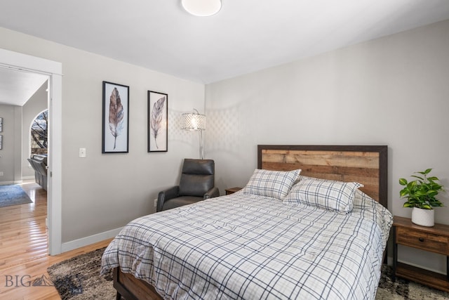 bedroom featuring wood-type flooring