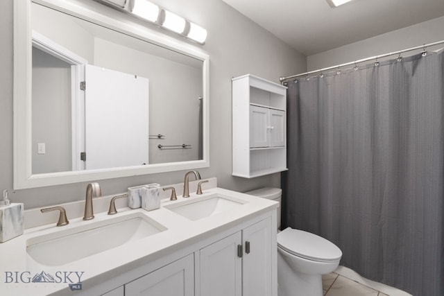 bathroom featuring vanity, a shower with curtain, and toilet