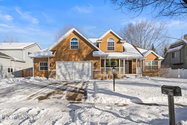 view of front of house with a garage and covered porch