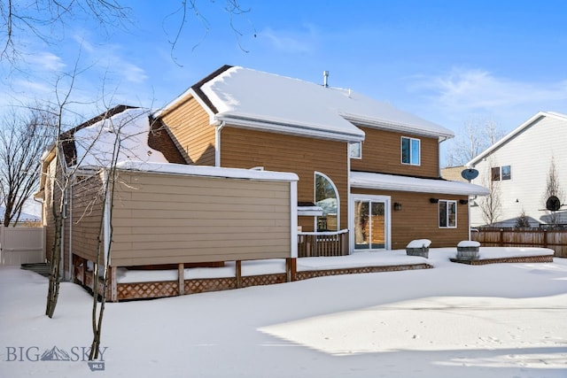 view of snow covered house