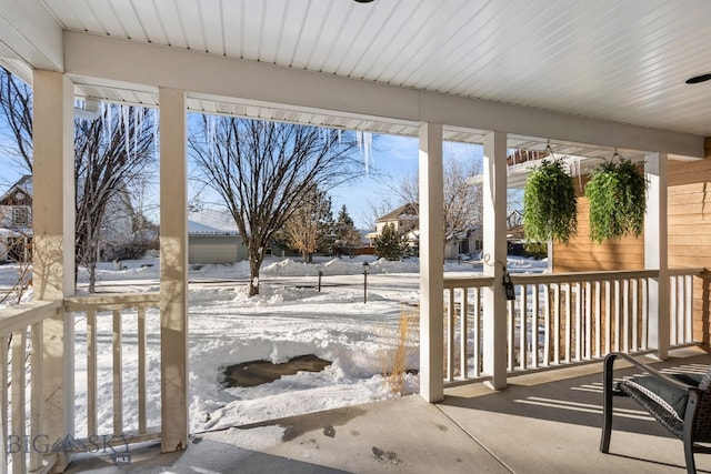 view of snow covered patio