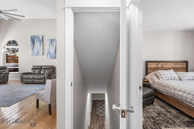 bedroom with hardwood / wood-style floors