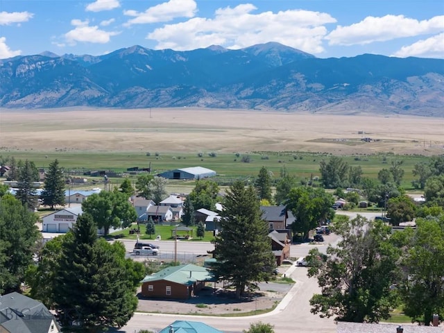 drone / aerial view featuring a mountain view