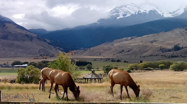 view of mountain feature with a rural view