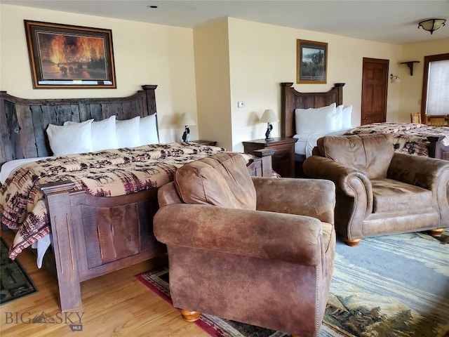 bedroom with light hardwood / wood-style flooring